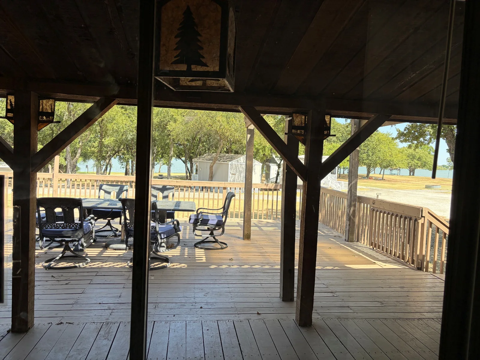 The covered deck at the bathhouse, looking out over the park