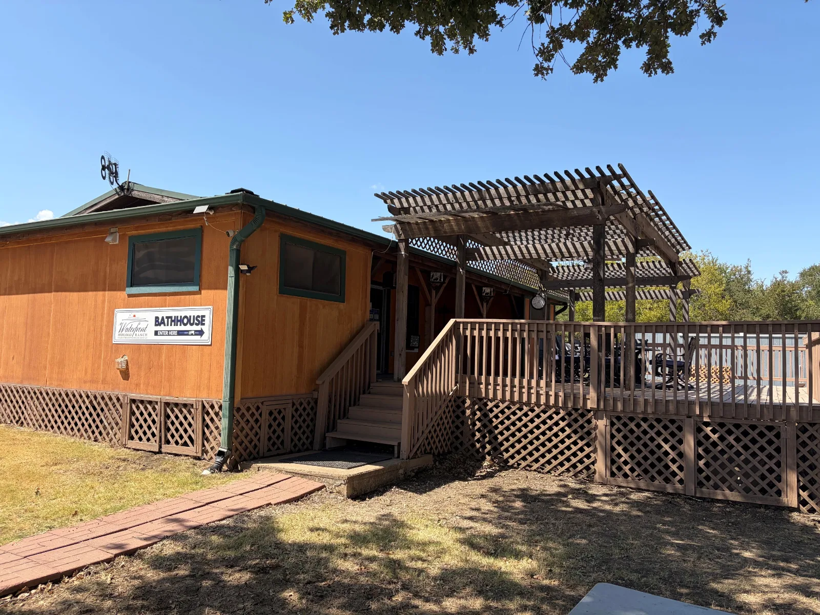 The bathhouse at Waterfront Hideaway Ranch, with its pergola and deck