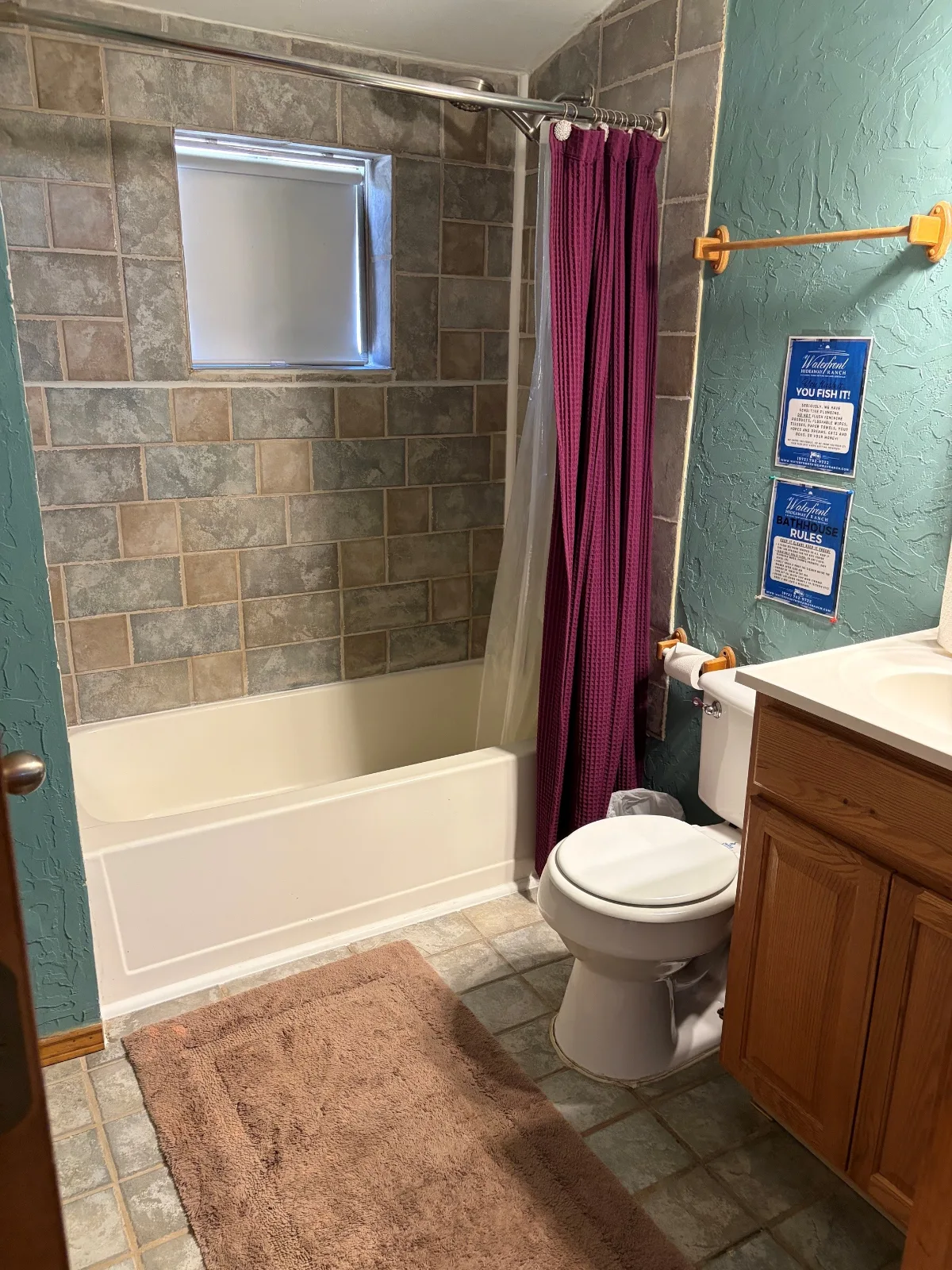 A bathhouse room with a tub and shower