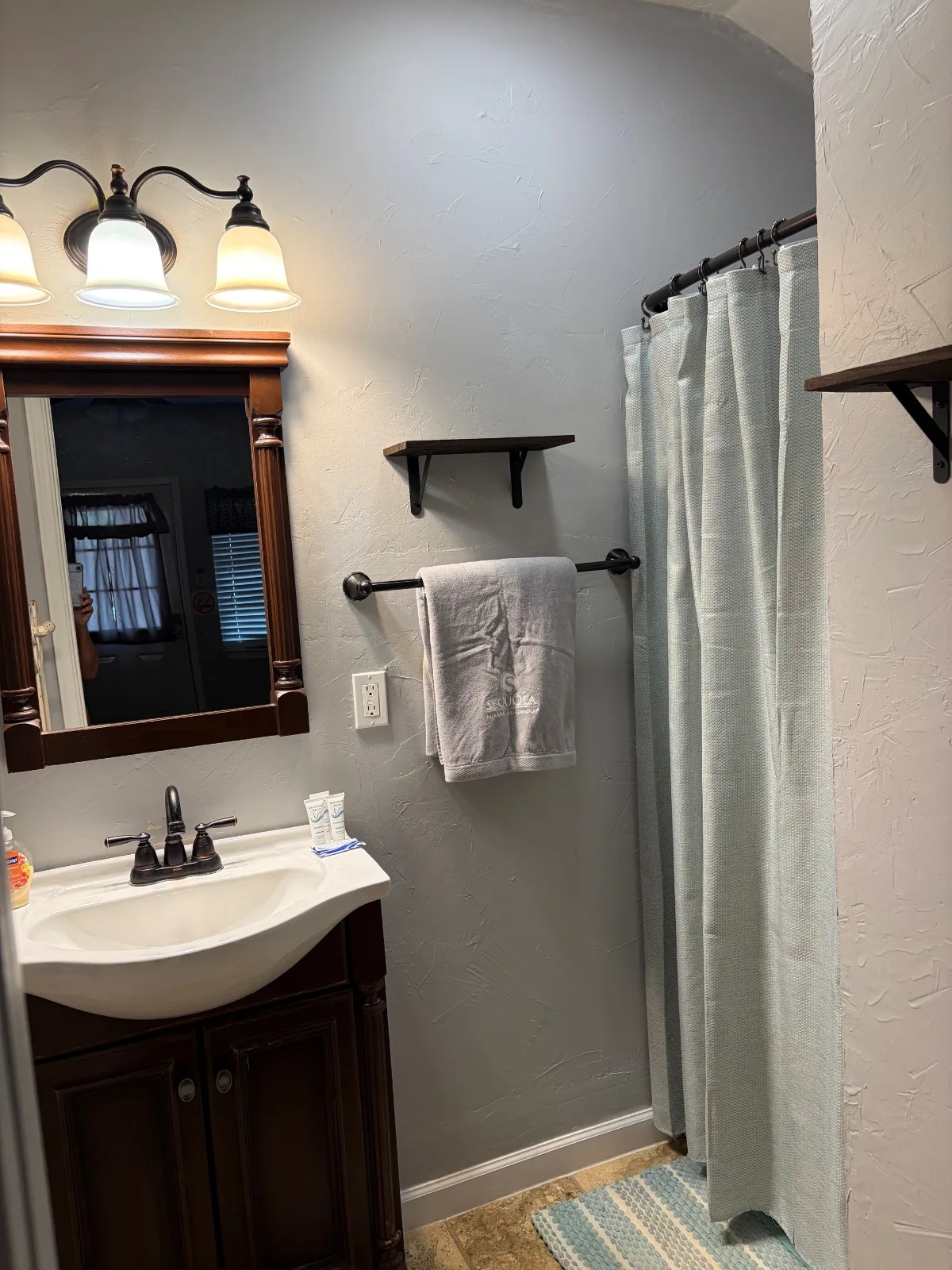 The shower and vanity in Cabin 1