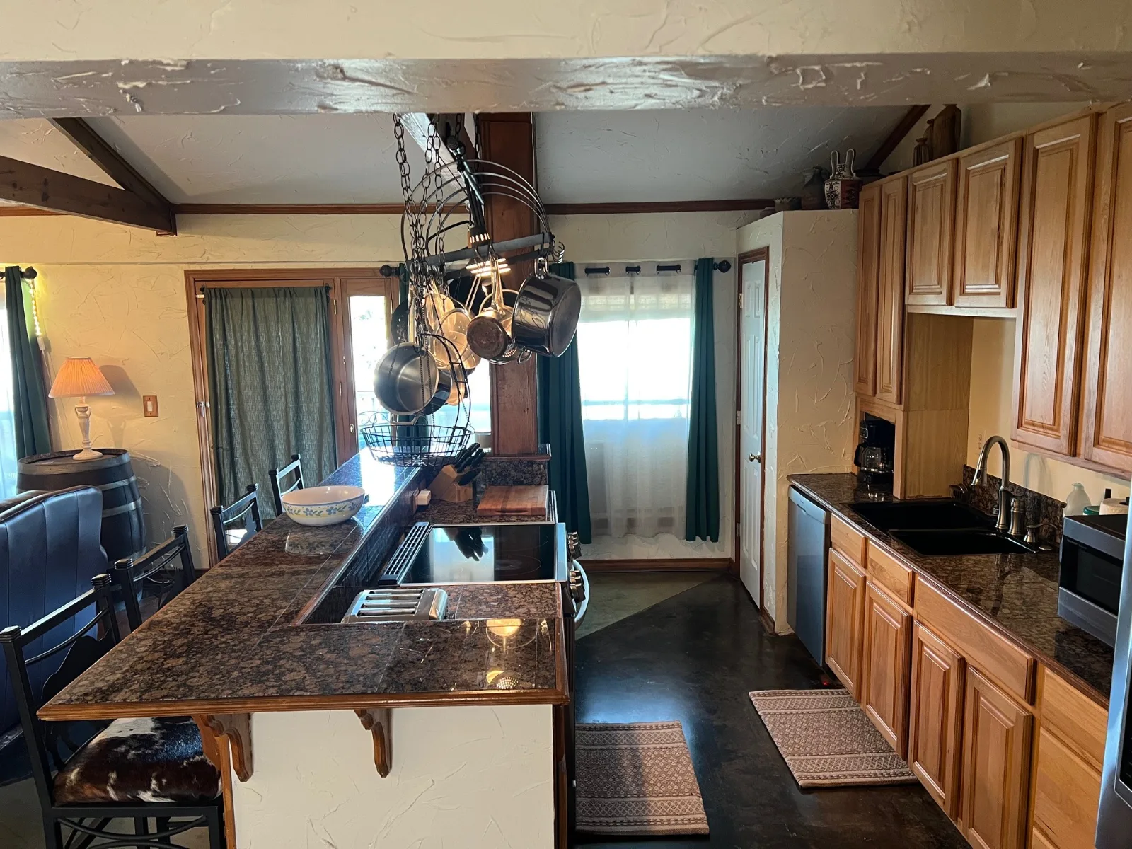Cabin 3 kitchen with copper pot rack