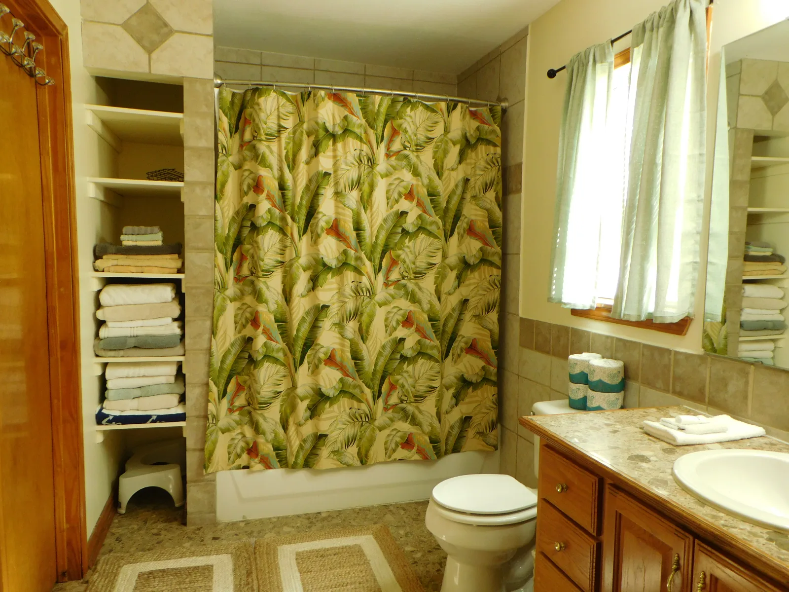 The primary bathroom in Cabin 3, with a tub and shower