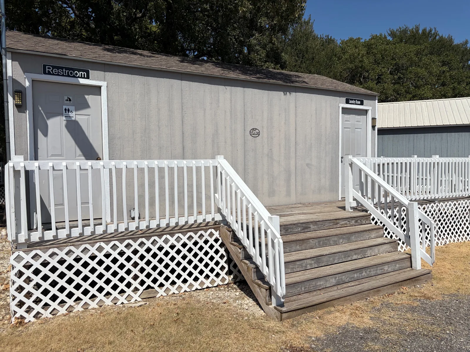 The laundry building at Waterfront Hideaway Ranch, with the laundry room and a second guest restroom