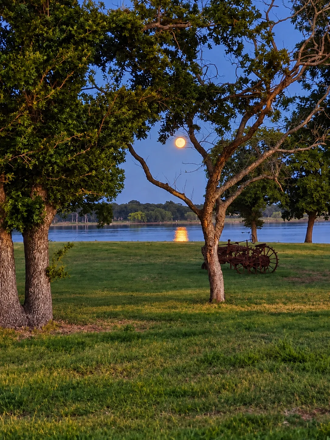 A full moon rising over Lake Lewisville from the ranch