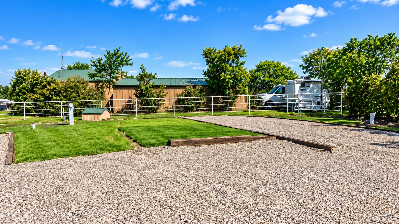 A Premium RV site with synthetic turf at Waterfront Hideaway Ranch